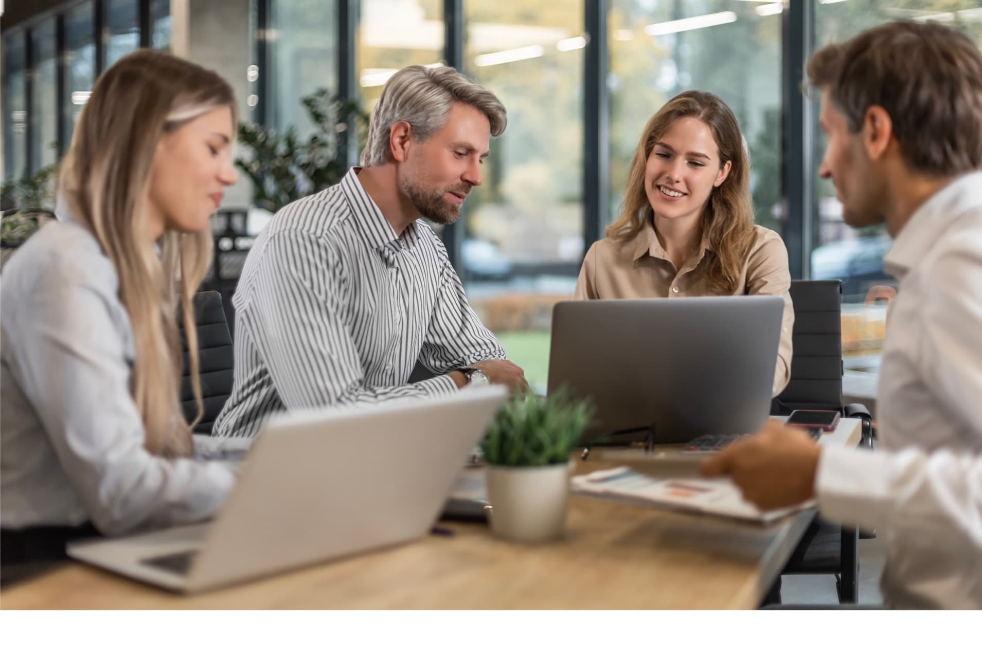 Product team collaborating in a modern office meeting room